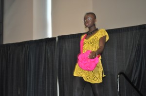Fashion Show Green Festival Fashion Show Yellow Crochet Top with Black Pants and Pink Purse